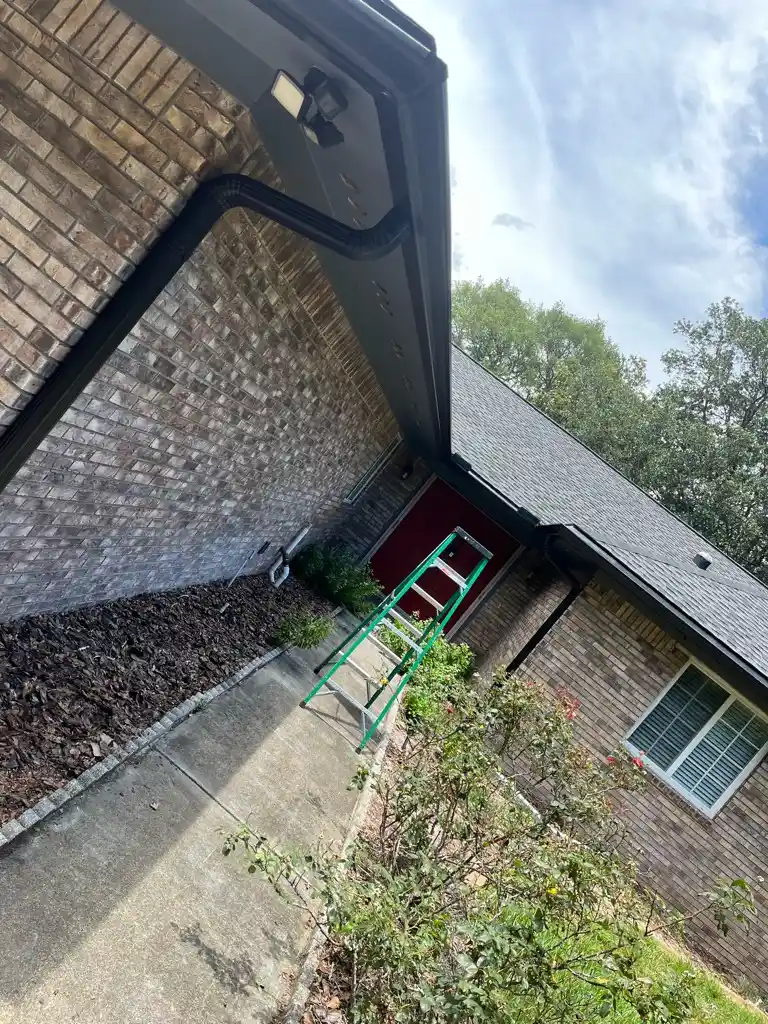 How are downspouts installed?