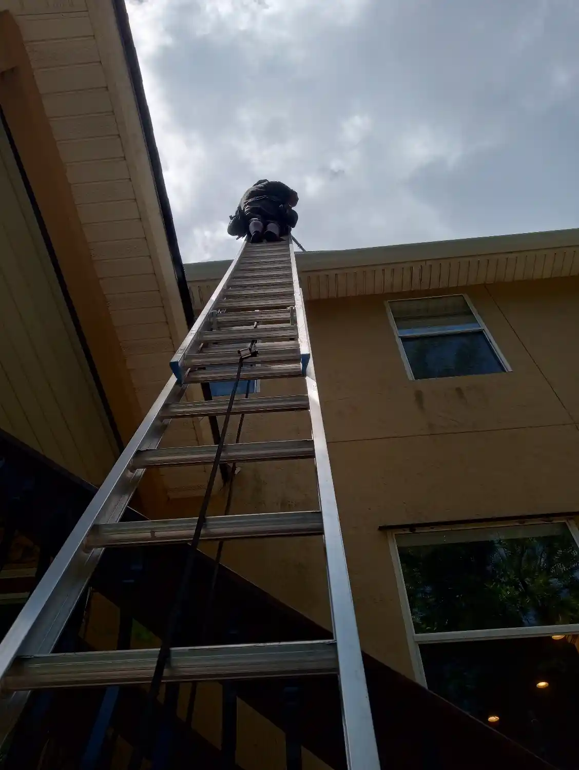 What is the best way to clean a downspout?